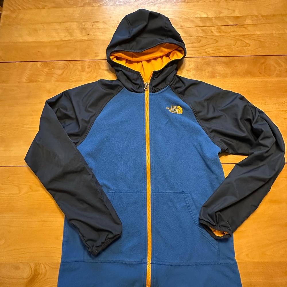 The North Face Blue and Navy zip-up with Orange Lining